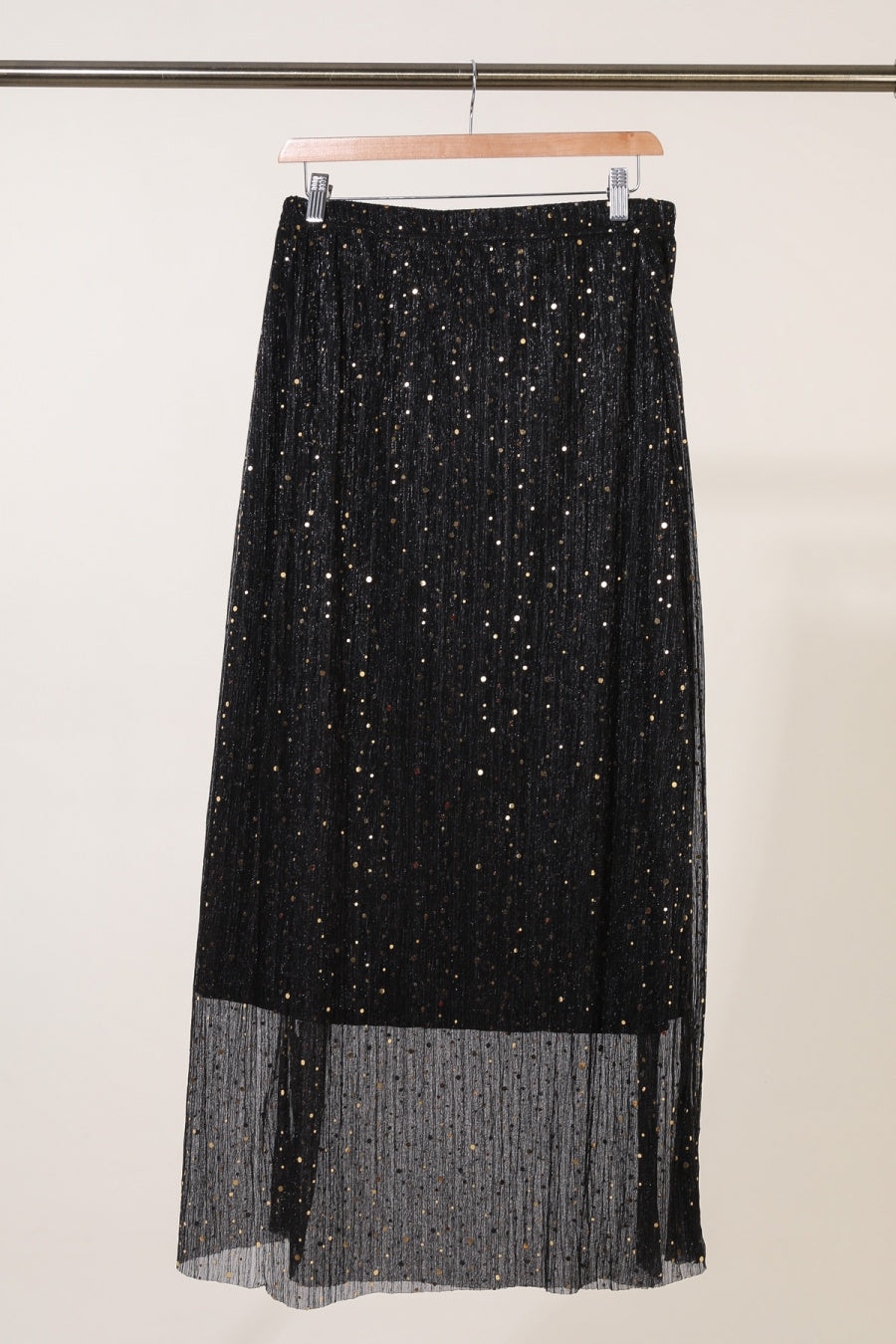 La jupe plissée à paillettes