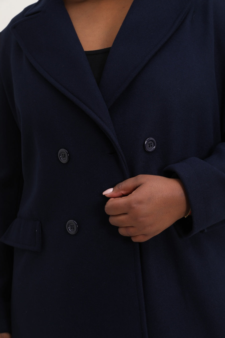 Le manteau à ceinture