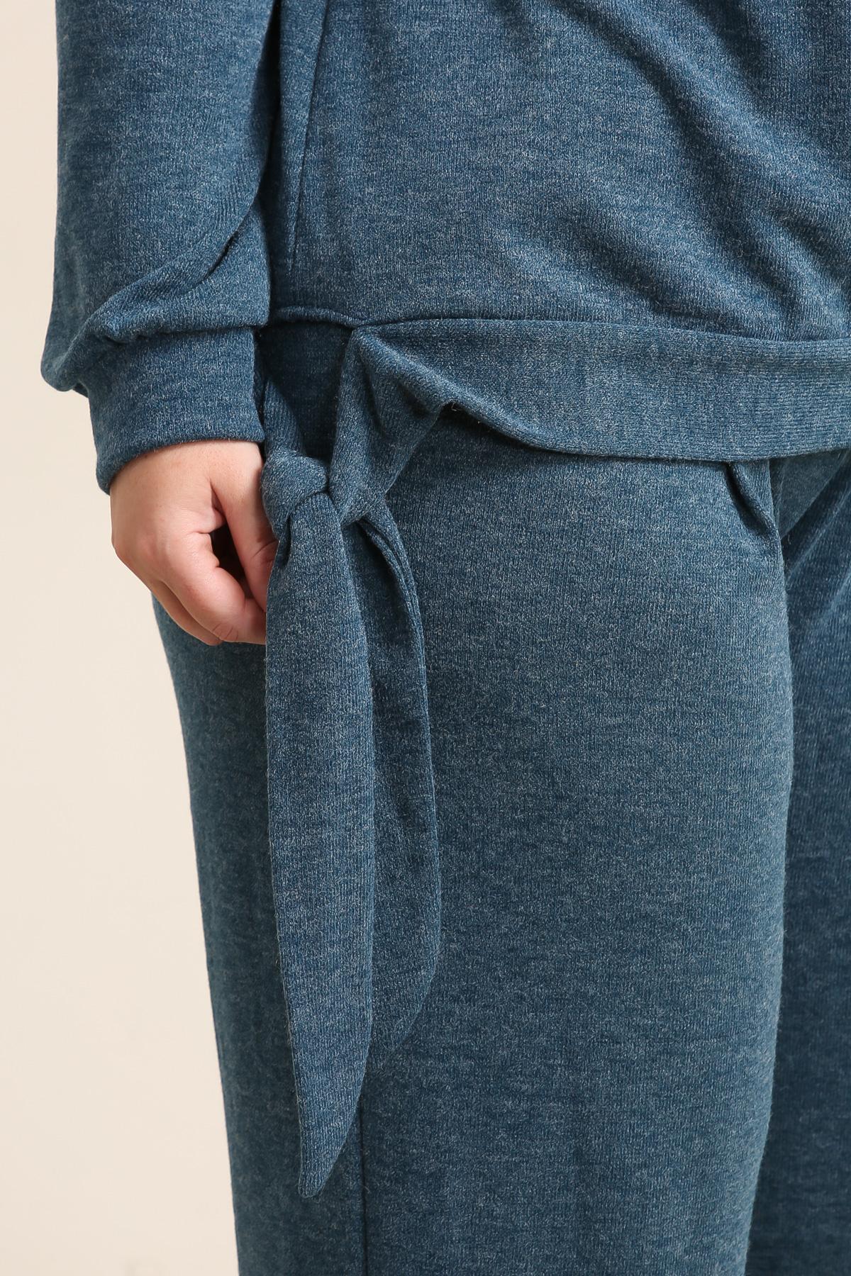 Le pantalon fluide à pinces