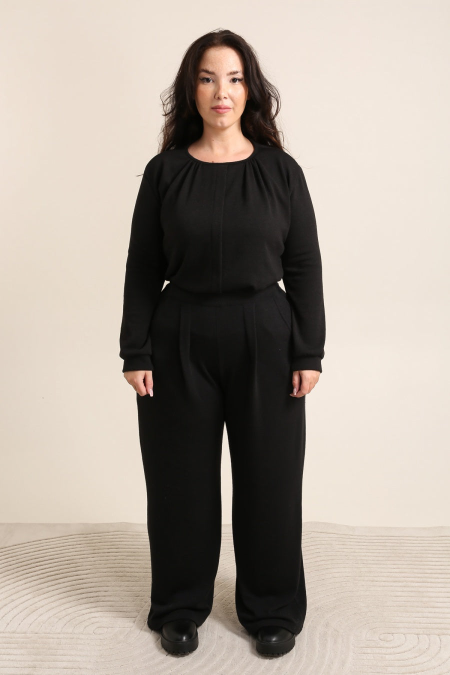 Le pantalon fluide à pinces