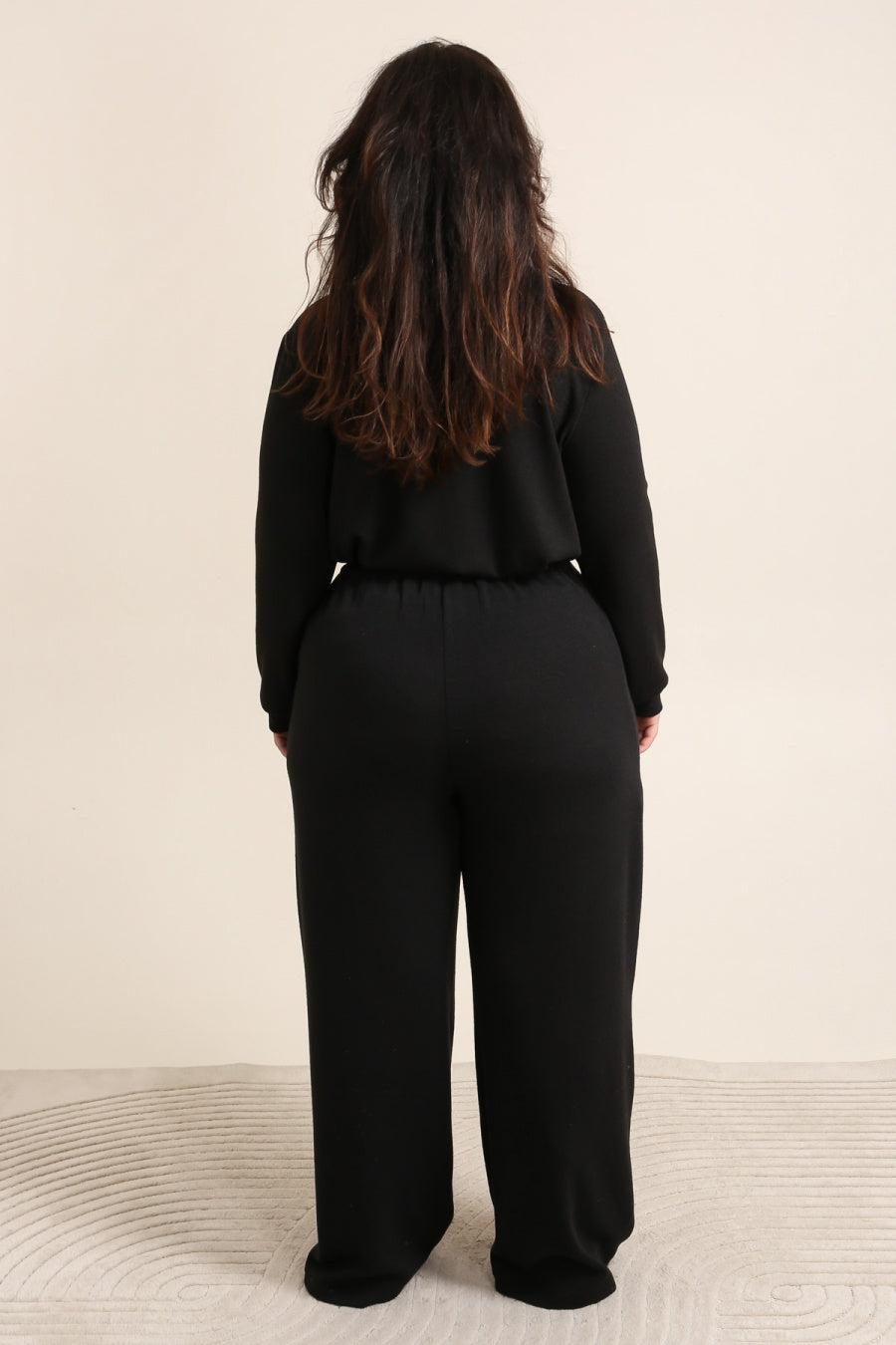 Le pantalon fluide à pinces