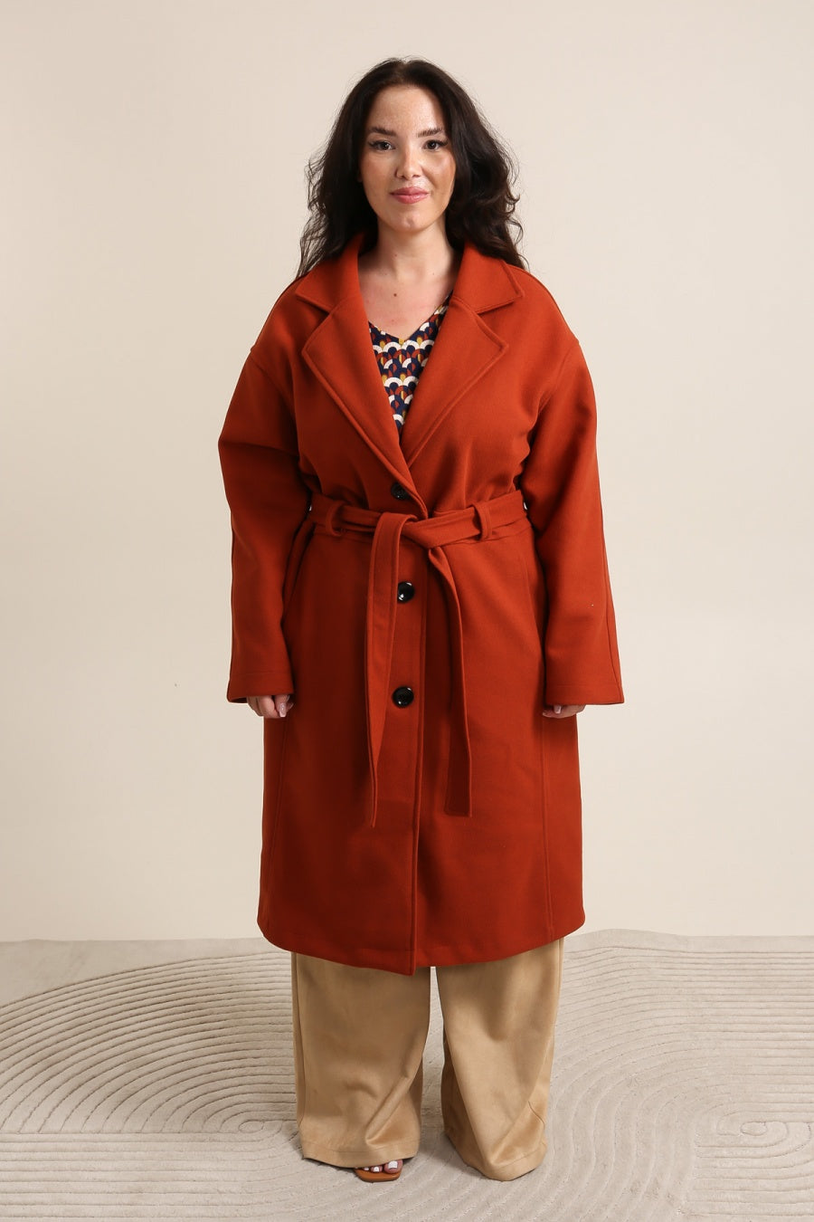 Le manteau à ceinture