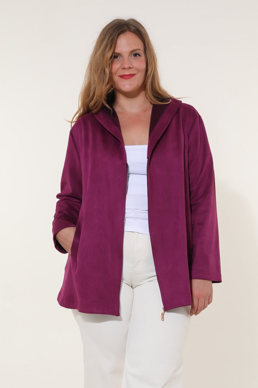 Le gilet à capuche