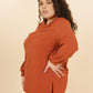 La blouse col haut
