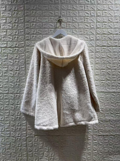 Le manteau fausse fourrure
