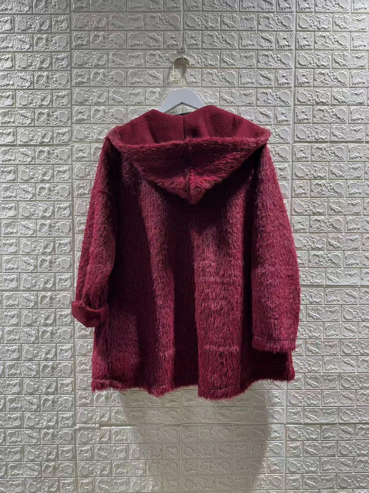 Le manteau fausse fourrure